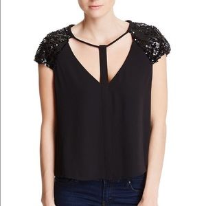 BCBG black top with sequin sleeves